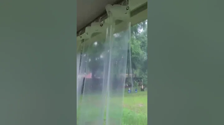 Screened in Porch with Shower Curtain Rain Guards.