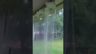 Screened in Porch with Shower Curtain Rain Guards.