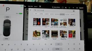 How to search Spotify in the Tesla Model 3 V10 for a specific song album or playlist screenshot 5