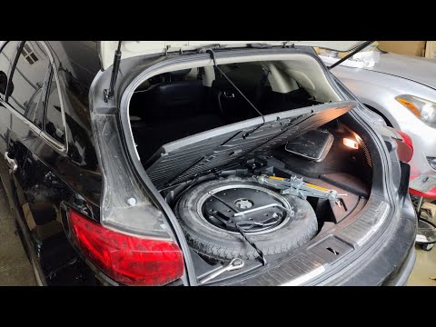 2009 Infiniti FX Trunk Access to Spare Wheel. Check out this cool feature