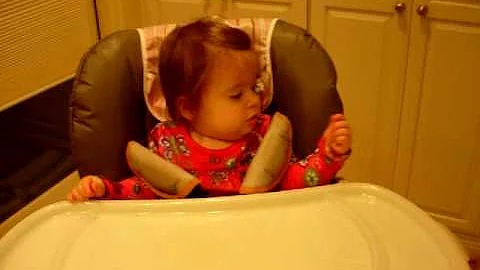 Julia Keene in high chair