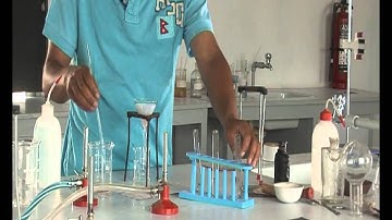 Lab demonstration separating of sand and salt using filtration