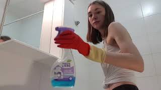 Skinny girl cleans the bathroom in red gloves and white top | part 1