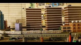 N/Scale Subway Trains And Kato Unitram Running Around In The Model City. Part3