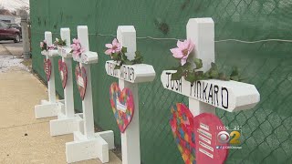 Aurora Man Places White Crosses For Victims Of Henry Pratt Company Shooting