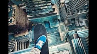 اشخاص يخاطرون بحياتهم من اجل المتعة -- crazy people are not afraid of heights