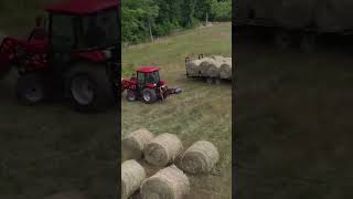 Unloading some spring hay! #shorts #farming #tractor