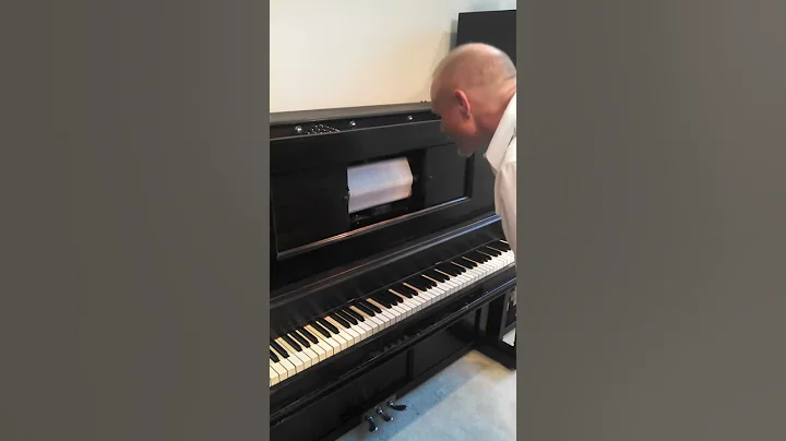 Patrick Mackey, master piano technician at work