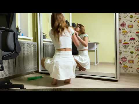 Tina in skirt cleans the mirror | Clean with me