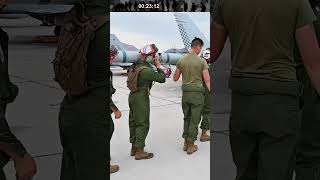Loading weapons onto F/A-18 Hornet fighter jet