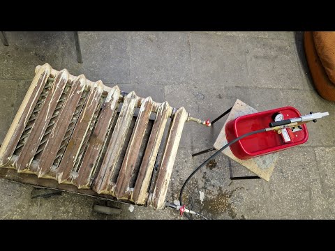 Опрессовка давлением чугунной батареи после ремонта