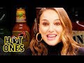 Natalie portman pirouettes in pain while eating spicy wings  hot ones