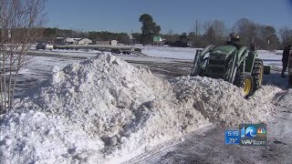 Team coverage: Crews work to clear icy roads.