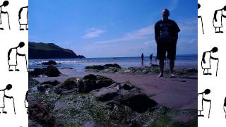 Grandad goes paddling in the sea