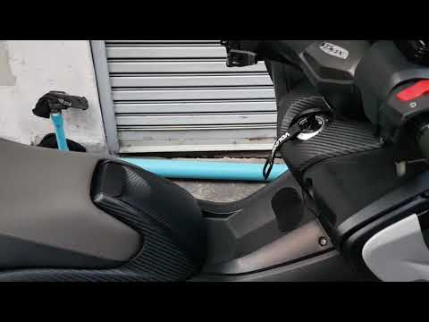 Tmax 530 seat auto liftup