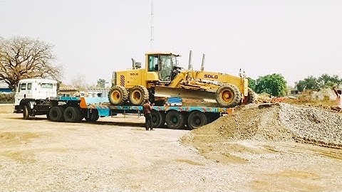 Grader Unloading for Trailer.
