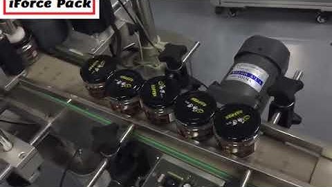 Automatic food glass bottle jar positioning labeling machine testing video for small bottle