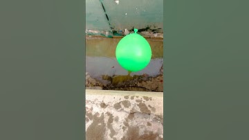 Will a water balloon explode if it rolls down from a tall building! #satisfying #balloon