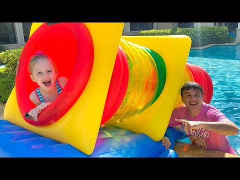 Nastya and dad are going to swim in the pool