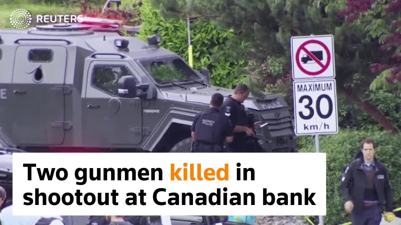 Two gunmen killed in shootout at Canadian bank - YouTube