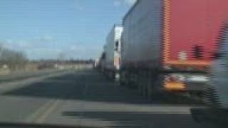Ukrainians across border in Poland remain defiant