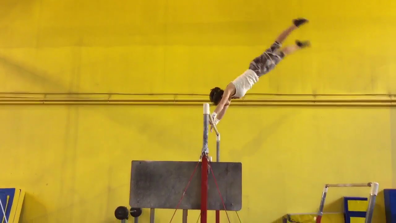 Cassandre P. sortie tendue vrille en barres A'tous Gym Draveil YouTube