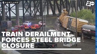 Train Derails On Steel Bridge