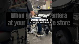 Playing Pantera at my local music store!