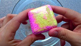 Dissolving the cube in water. Threw cube into water | X54