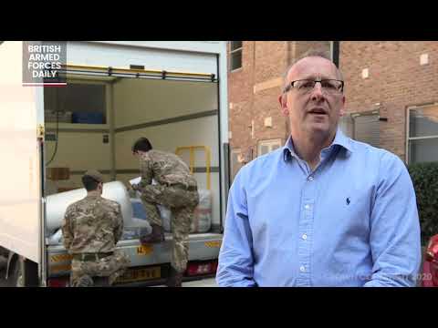 1st Battalion The Coldstream Guards assist with moving medical equipment for NHS