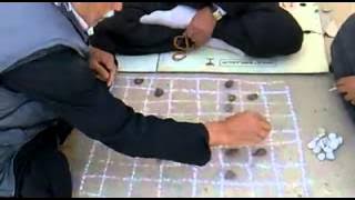 Old man gives noob a checkers lesson.