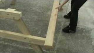 How to build a traditional style picnic table capable of seating eight people. The table is constructed solely of 2x4 lumber. Go to http:/