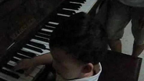 Lewis Chew at the piano