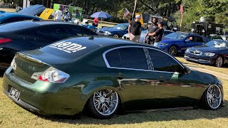 Green Car Tries To Fit In With Supercars