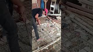 Bending wire mesh using a manual bending wrench.