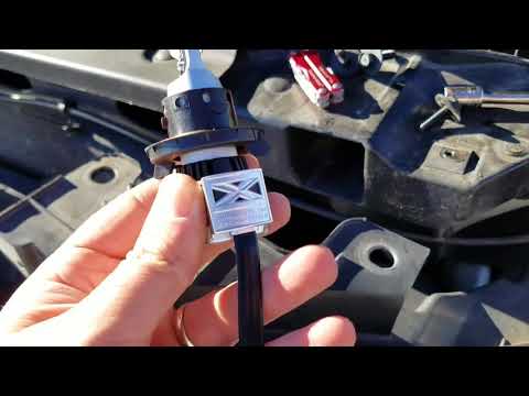 Video: Bagaimana anda menyesuaikan lampu depan pada Ford f150 2013?