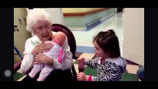 YOU ARE MY SUNSHINE!  Great grandmother sings to her great grandaughter