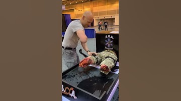 EMS World Expo Attendee puts X8T Tourniquet on in 5 Seconds!