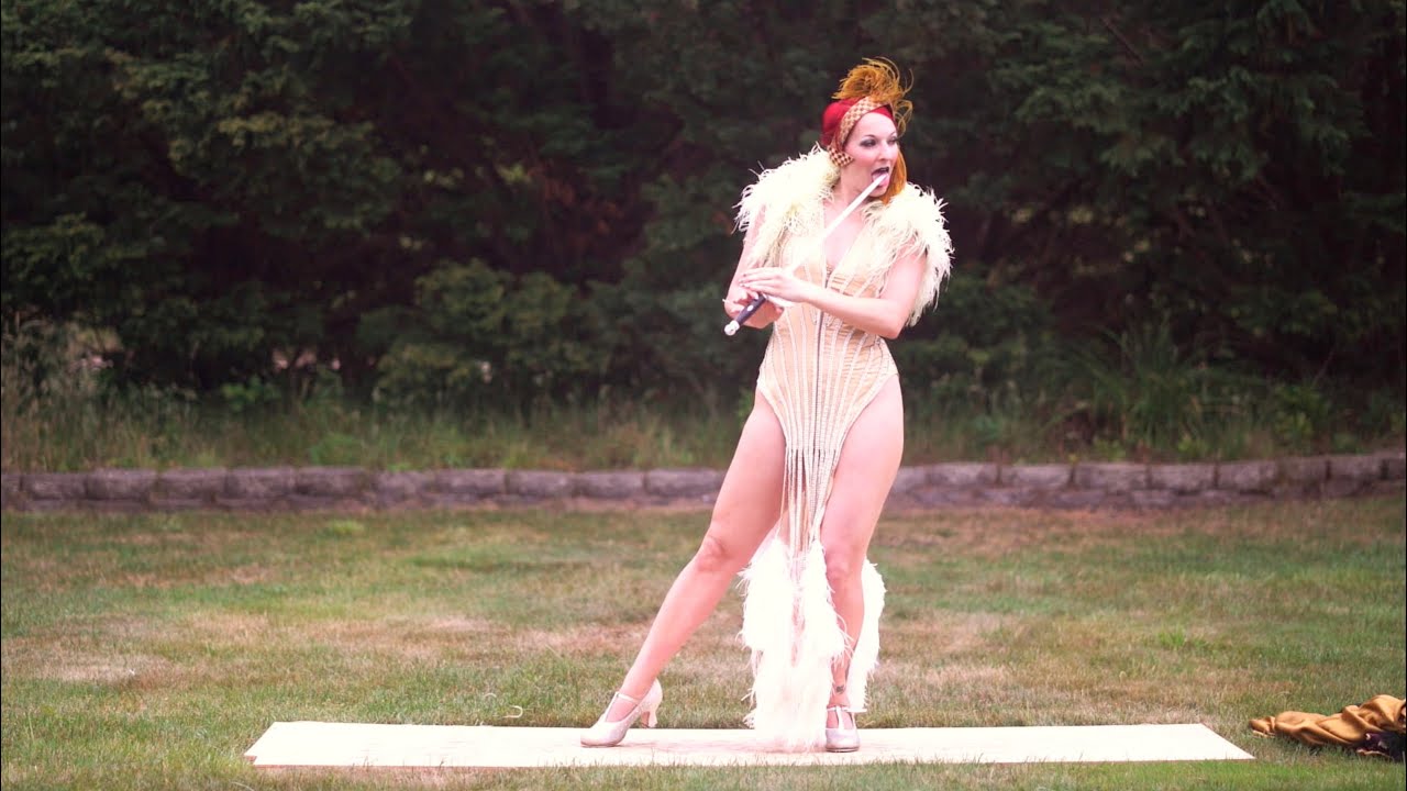 GIN MINSKY performs (tap / dance / sword swallow)