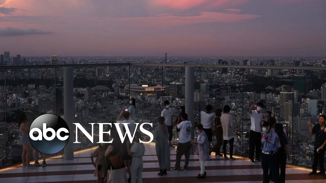 Tokyo prepares, wildfires burn, heavy rain inundates China: World in Photos, July 22