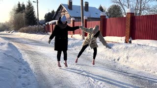 Two Girls In The Same Platform Wedges On Slippery Ice, High Heels Flip-Flops On Ice Walking