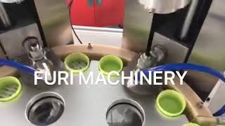 Cap wadding lining foil inserting machine