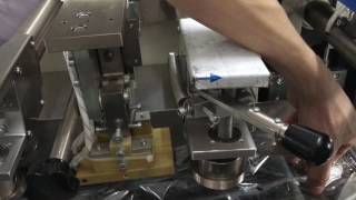 how to adjust middle sealing film , down paper packing machine