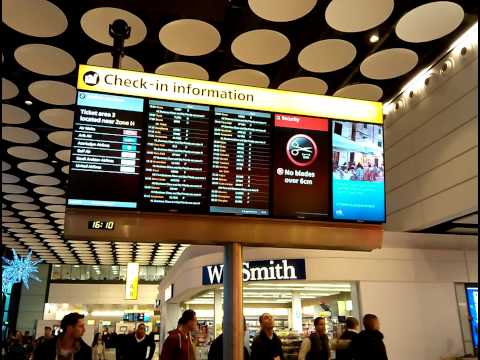 Digital Check-in Information Panel, London Heathrow Airport Terminal 4, UK (27th Dec 2013)