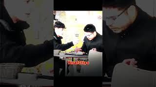 Young boy helps disabled man eat his food #kindness #help #viral #viralclips #shorts