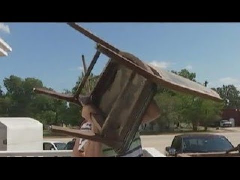 KTBC - People in La Grange clean up after historic flood