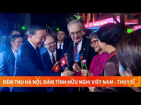 General Secretary and President To Lam and Swiss President Guy Parmelin stroll around Hoan Kiem Lake