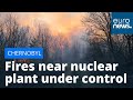 Forest fires near Chernobyl nuclear plant under control, Ukraine authorities say