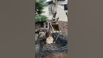 Creating a Koi Pond with Weathered Limestone Boulders