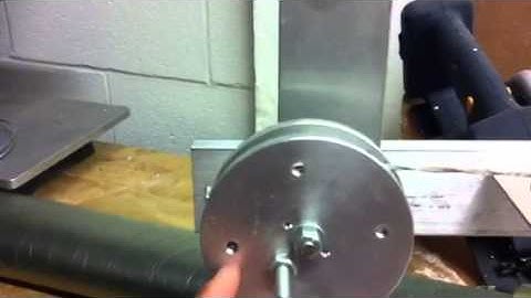 Mass-pulley - spring system